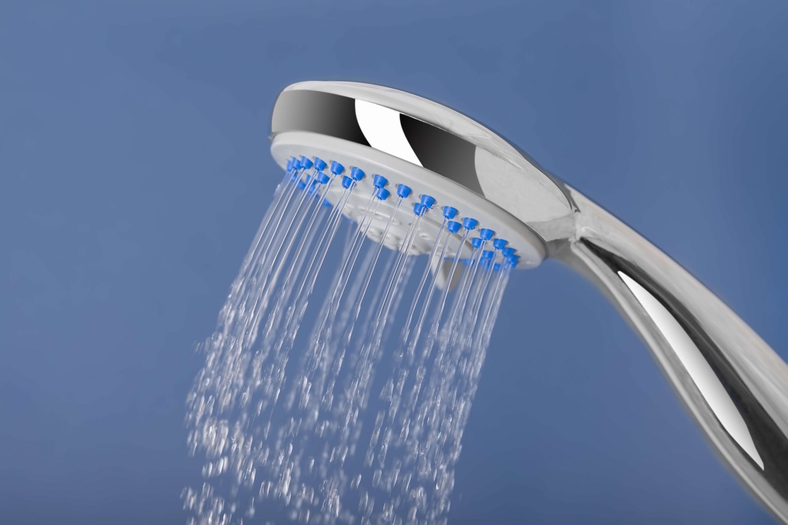 bigstock Water Pours Out Of The Shower 57845846 scaled 1